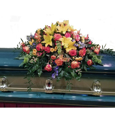 Heavenly Sunrise Casket Spray from your local Clinton,TN florist, Knight's Flowers