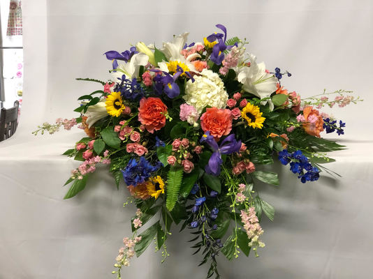 Angel Whispers Casket Spray from your local Clinton,TN florist, Knight's Flowers